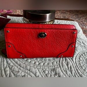 Coach dark orange pebble leather wallet